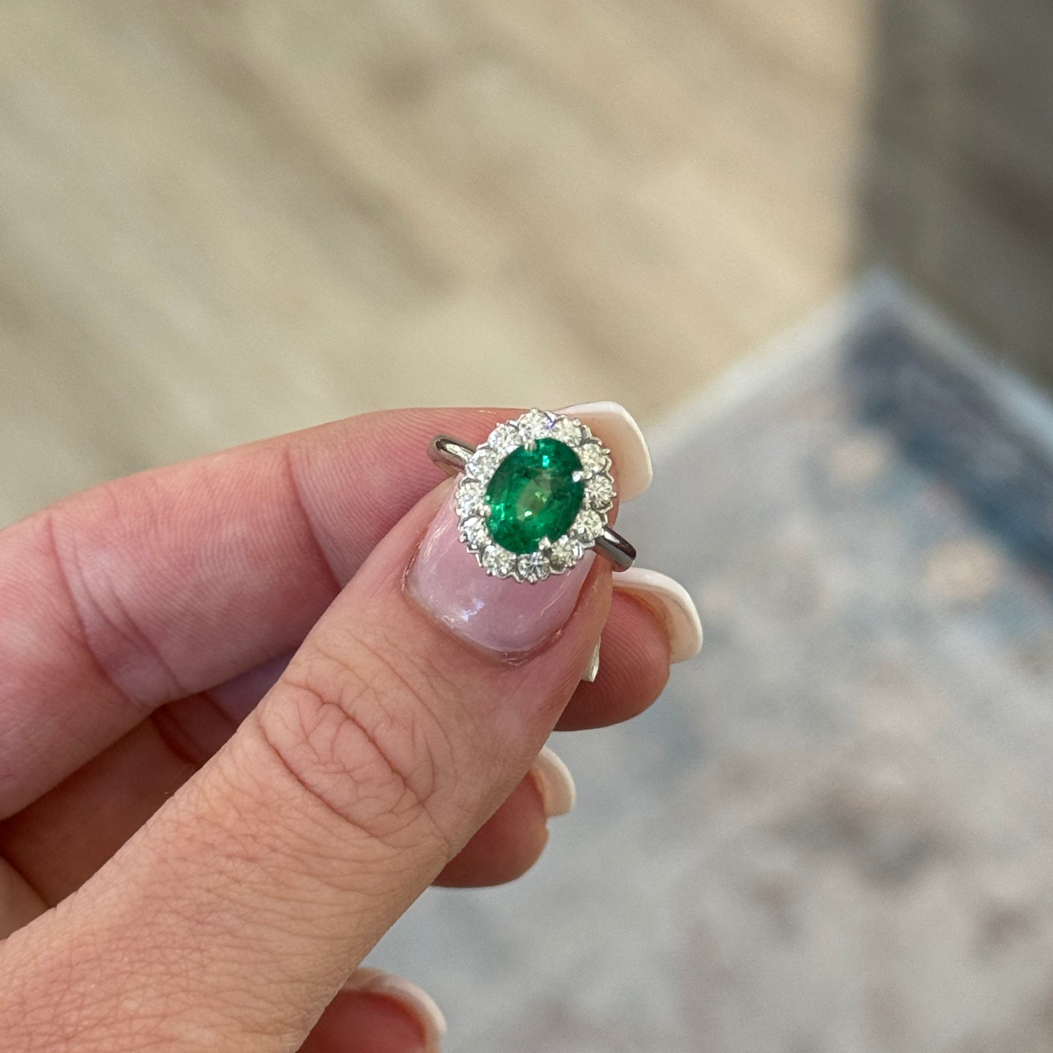 18K White Gold Oval Emerald and Diamond Halo Ring