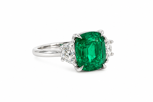 Platinum 2.87ct Cushion Cut Emerald and Diamond Three-Stone Ring
